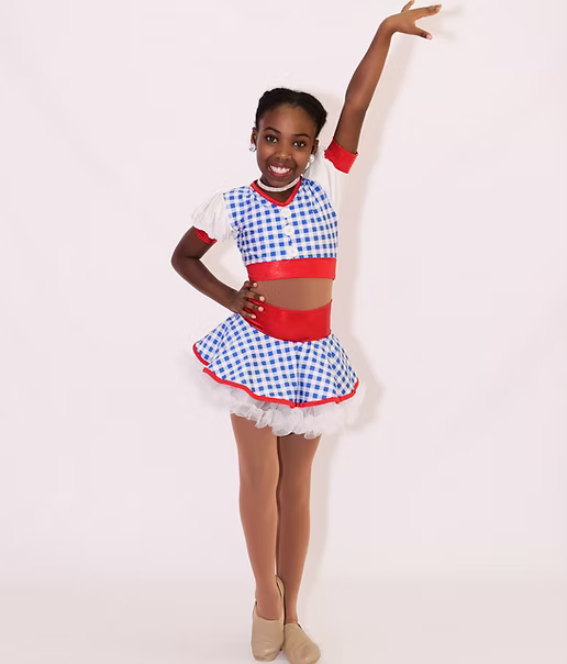 Dancer in a blue and white checkered outfit